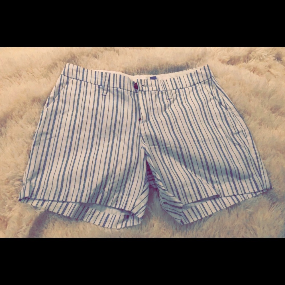 Old Navy shorts, white with blue stripes.
